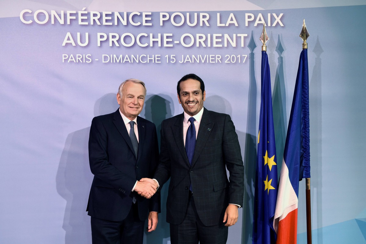 Foreign Minister H E Sheikh Mohammed bin Abdulrahman Al Thani with French Foreign Minister Jean-Marc Ayrault in Paris yesterday.