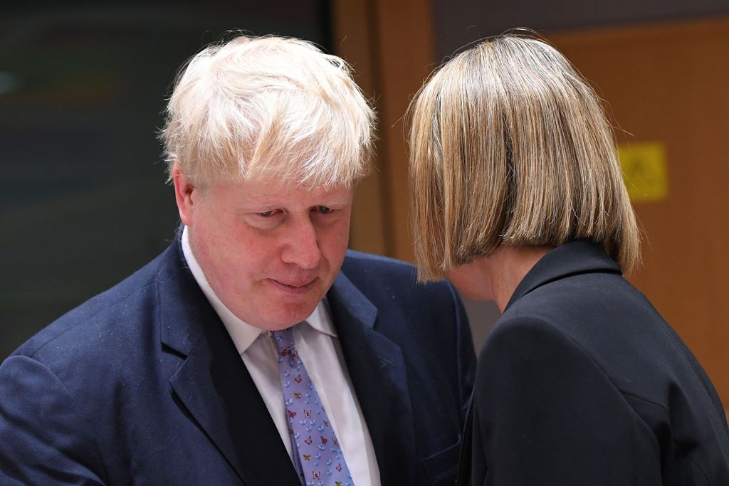 British foreign minister Boris Johnson (L) listens to EU foreign policy chief Federica Mogherini during an EU foreign ministers meeting at the European Council, in Brussels, on January 16, 2017. AFP / EMMANUEL DUNAND