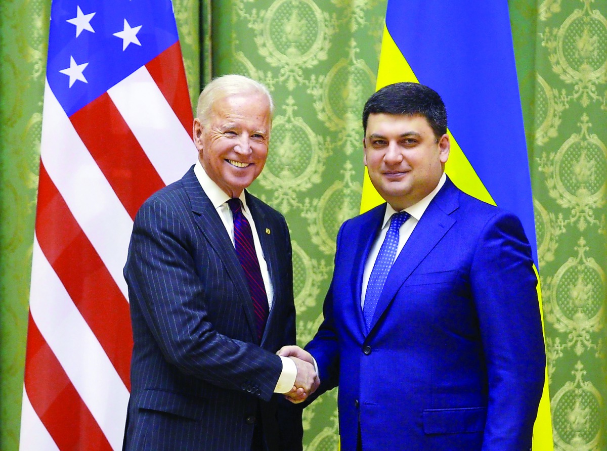 US Vice President Joe Biden (left) and Ukrainian Prime Minister Volodymyr Groysman shake hands during their meeting in Kiev, yesterday.