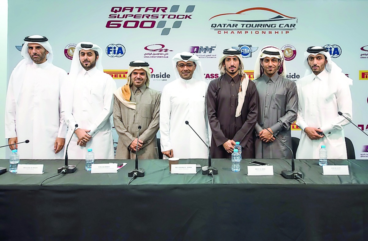 Qatar Motor and Motorcycling Federation President, Abdulrahman Al Mannai, Khalid Al Remaihi, General Manager of Losail Circuit Sports Club are seen along with QSTK 600 riders Saeed Al Sulaiti, Mashel Al Naimi and Nasser Al Malki and the drivers of the QTC