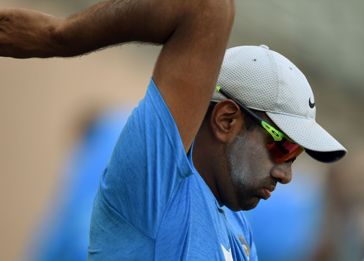 India's Ravichandran Ashwin warming up (file photo / AFP / PUNIT PARANJPE)