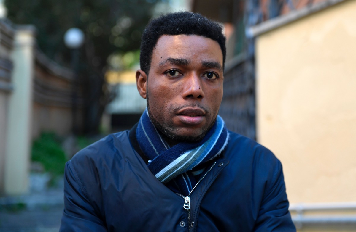 Cameroonian Pierre Yvan Sagnet poses on November 30, 2016 during an interview in Rome. It was a passion for football that made Cameroonian Yvan Sagnet want to pursue his studies in Turin, home to Italy's most famous club, Juventus. But once settled in the