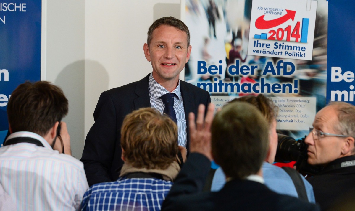 This file photo taken on September 15, 2014 shows the then Alternative fuer Deutschland (AfD) party's main candidate in Thuringia Bjoern Hoecke (C) speaking at a press conference in Berlin, following regional elections in the German states of Brandenburg 