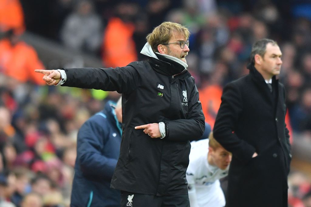 Liverpool's German manager Jurgen Klopp gestures on the touchline during the EPL football match between Liverpool and Swansea City at Anfield in Liverpool, north west England on January 21, 2017. AFP / Anthony Devlin 