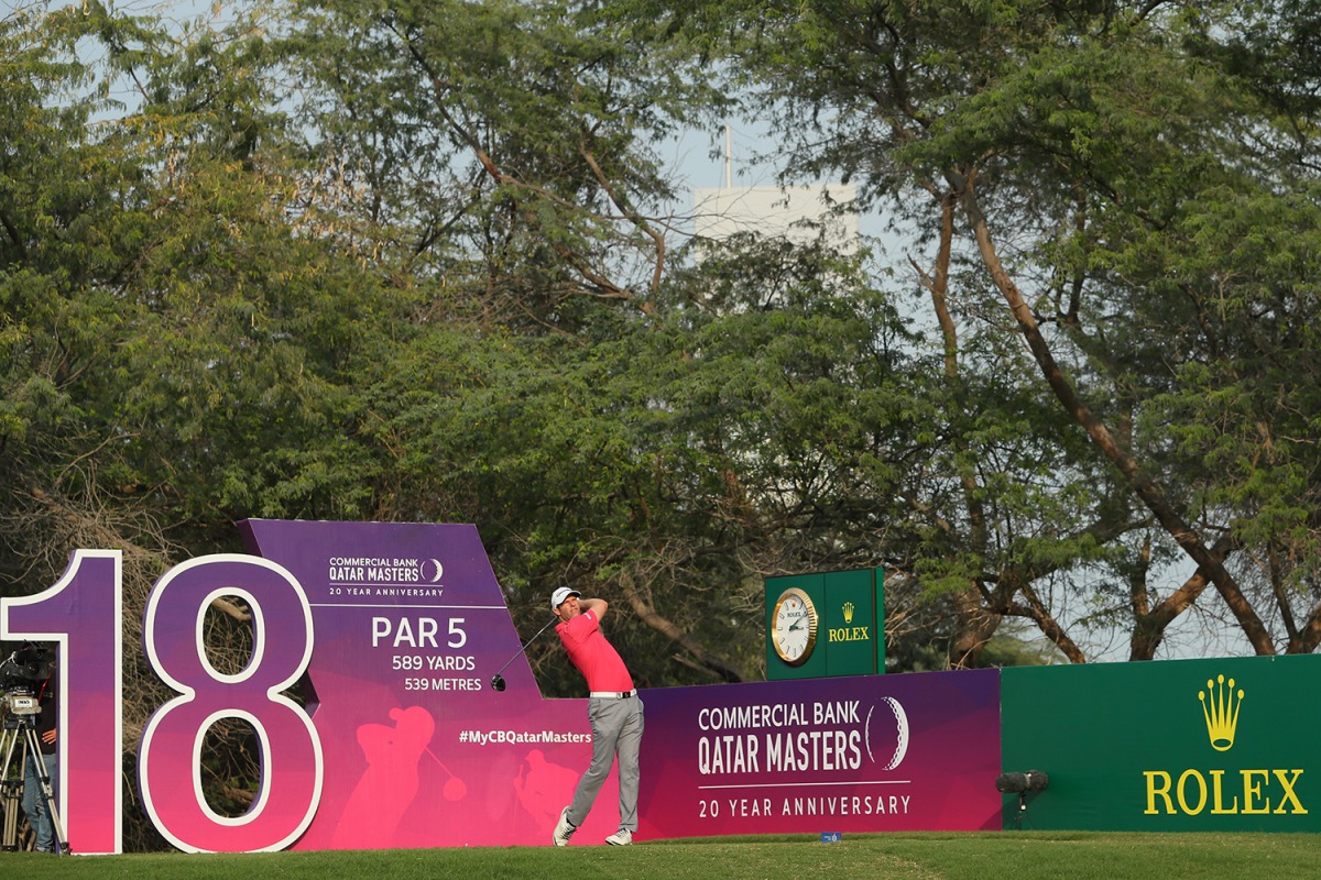 Bradley Dredge of Wales hits his tee shot on the 18th hole during the first round of the Commercial Bank Qatar Masters at the Doha Golf Club  yesterday.  Picture by by Andrew Redington/Getty Images