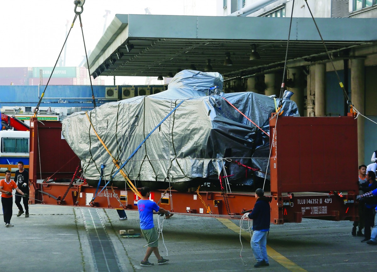 One of nine Terrex armoured vehicles waits to be loaded onto a truck at a cargo terminal in Hong Kong, yesterday.