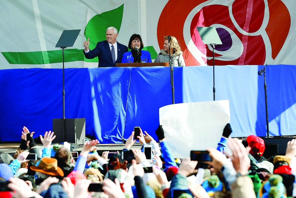 U.S. Vice President Mike Pence, his wife Karen and his daughter greet the crowd at the annual March for Life rally in Washington, DC, U.S. January 27, 2017. REUTERS/Yuri Gripas