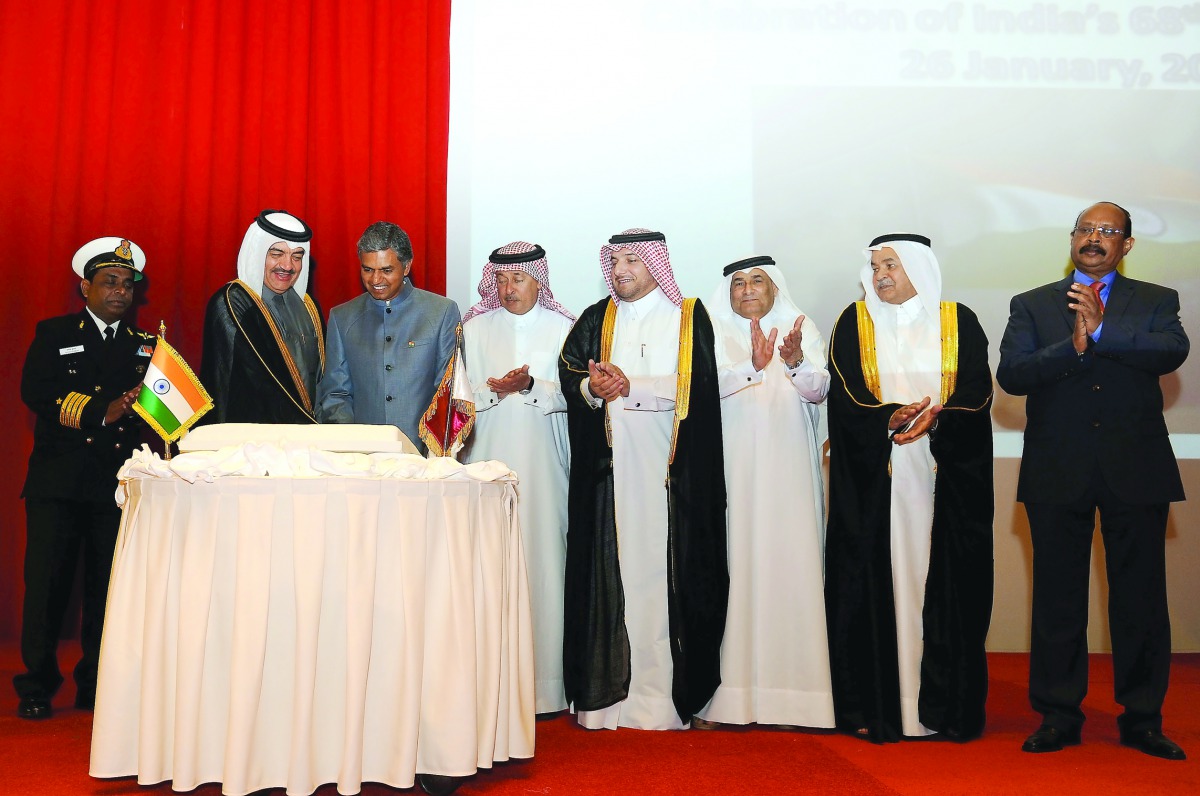 H E Mohammed bin Abdullah Al Rumaihi (second left), Minister of Municipality and Environment, and Ambassador of India P Kumaran (third left), cutting a cake at a reception hosted by the envoy to mark the 68th Republic Day of India at Doha Sheraton. Ambass