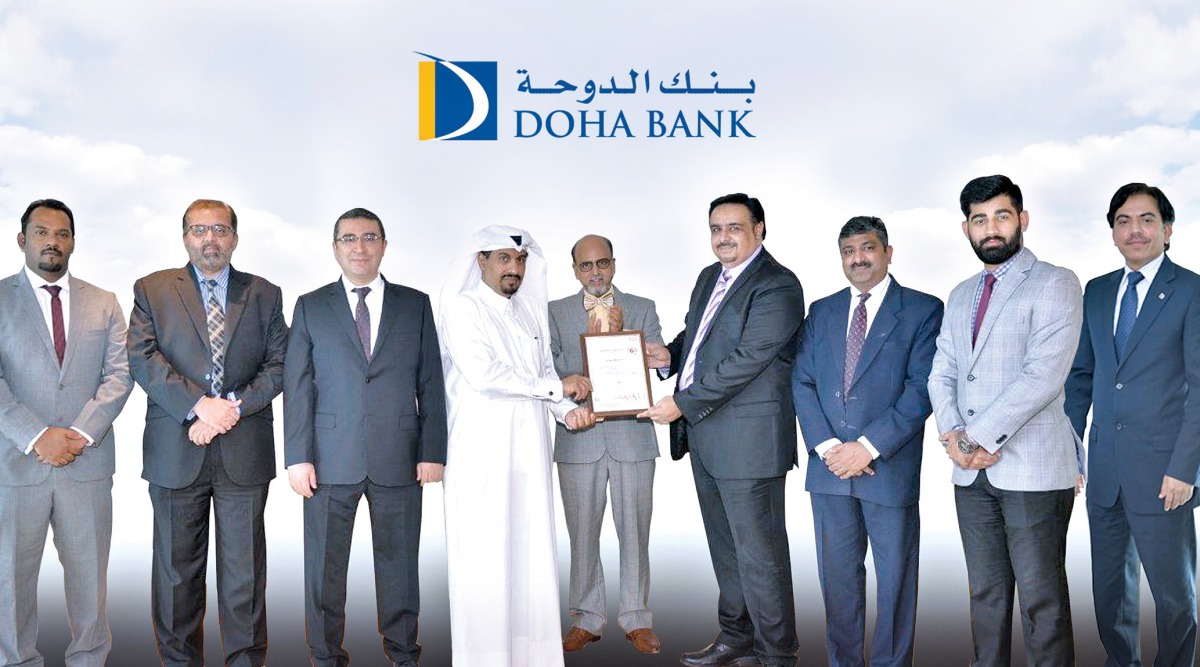 Dr R Seetharaman (centre), Group CEO of Doha Bank along with other senior officials at the award ceremony.