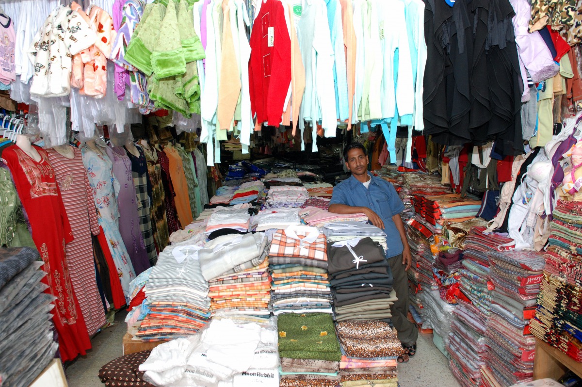 An undated file photo of a shopkeeper at Thursday Friday Souq. 
