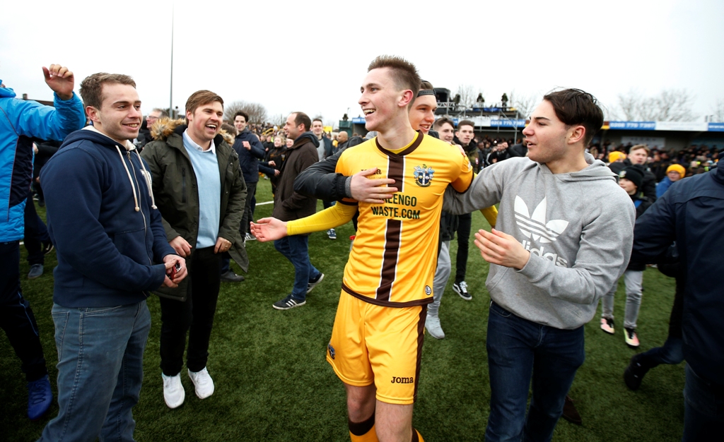 Sutton United players celebrate as fans invade the pitch at the end of the match Action Images via Reuters / Andrew Couldridge