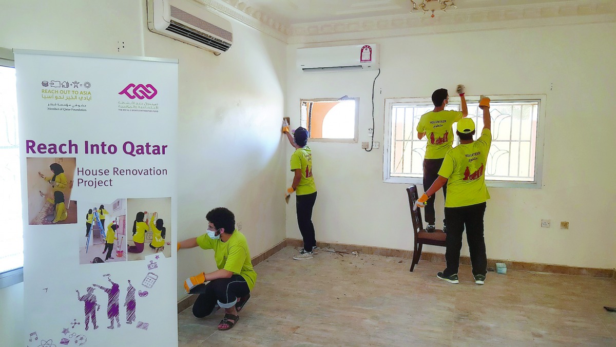 Youth volunteers help out in renovating a house in Al Gharafa as part of ROTA's ‘Reach into Qatar’ campaign