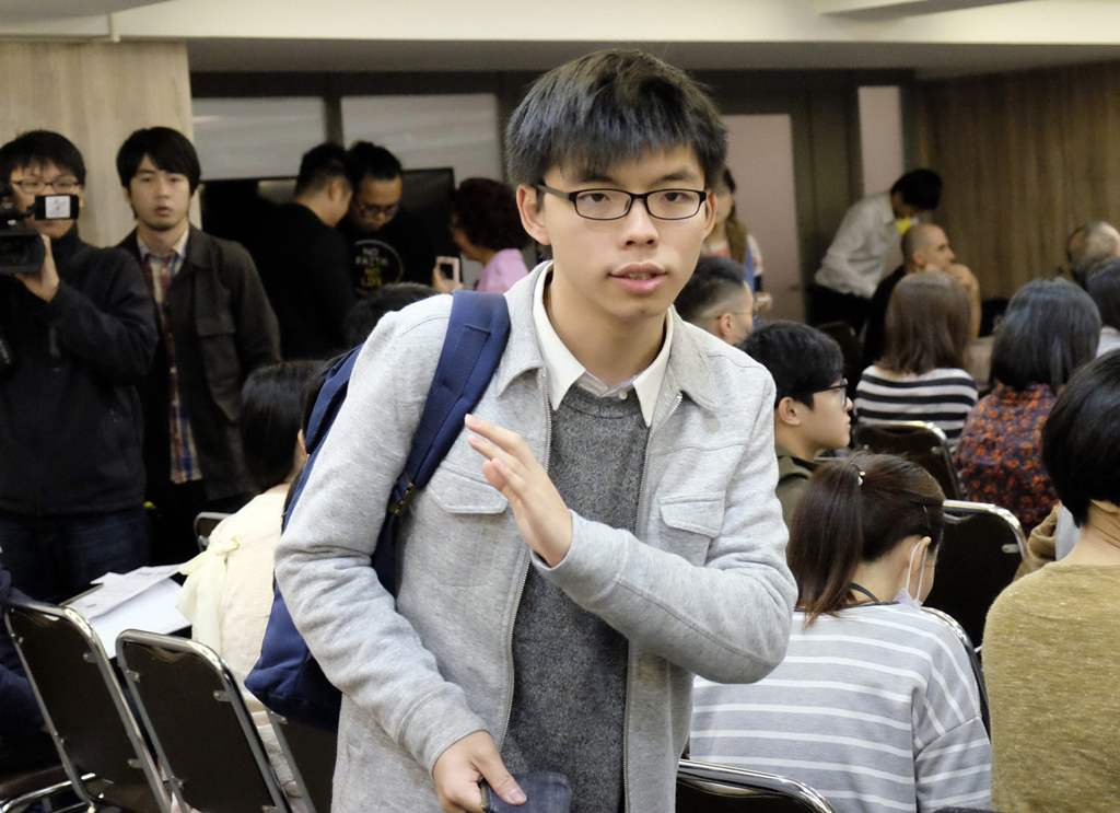 (FILES) This file photo taken on January 8, 2017 shows Hong Kong politician Joshua Wong attending a political forum hosted by Taiwan's grassroot New Power Party (NPP) in Taipei. AFP / SAM YEH
