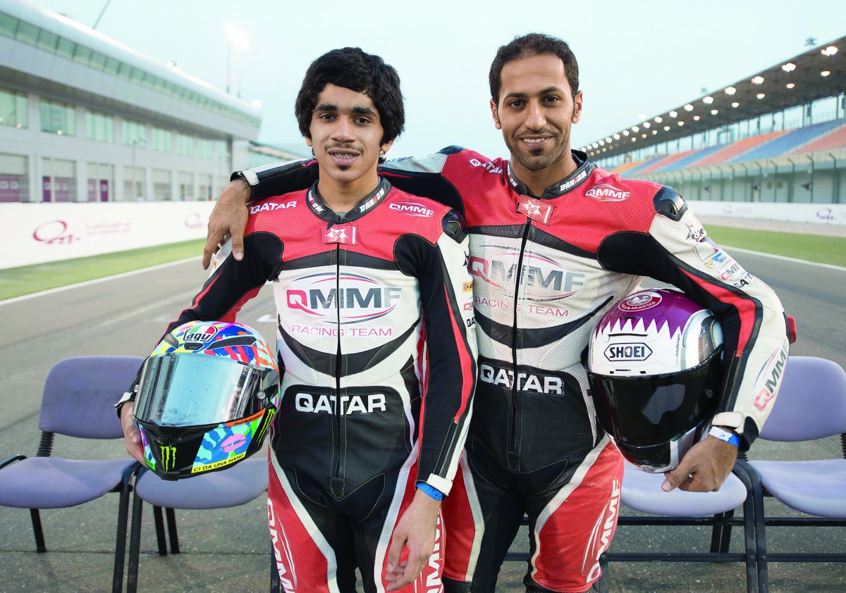 Saeed Al Sulaiti poses for a picture with 17-year-old Abdullah Al Qubaisi, the youngest rider in the championship.