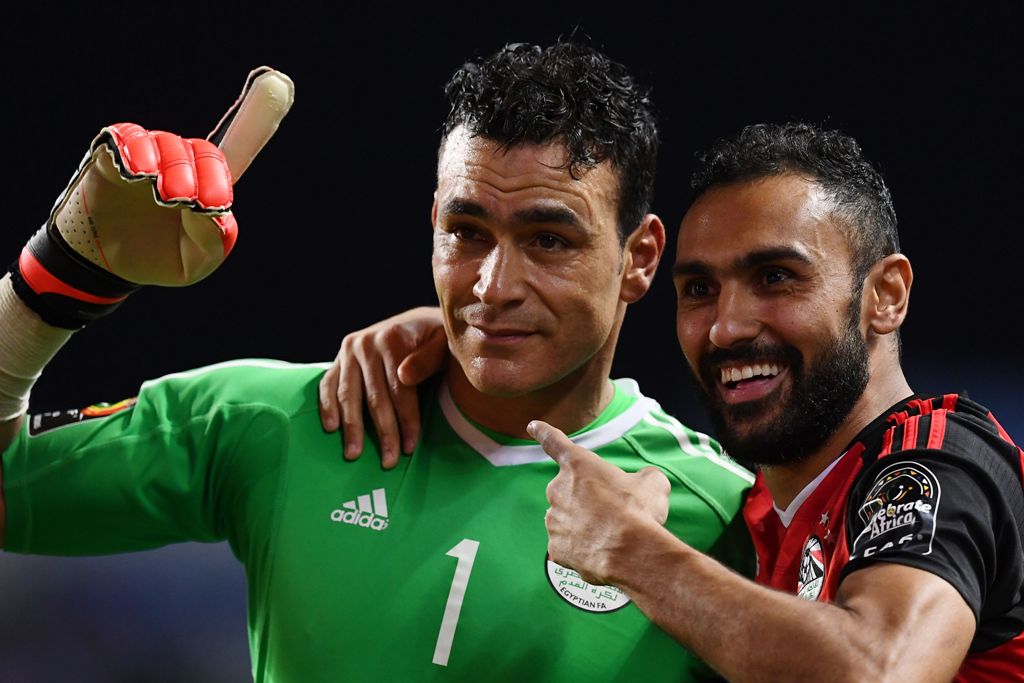 Egypt's goalkeeper Essam El-Hadary (L) and Egypt's midfielder Ahmed Elmohamady celebrate at the end of the penalty shootout of the 2017 Africa Cup of Nations semi-final football match between Burkina Faso and Egypt at the Stade de l'Amitie Sino-Gabonaise 