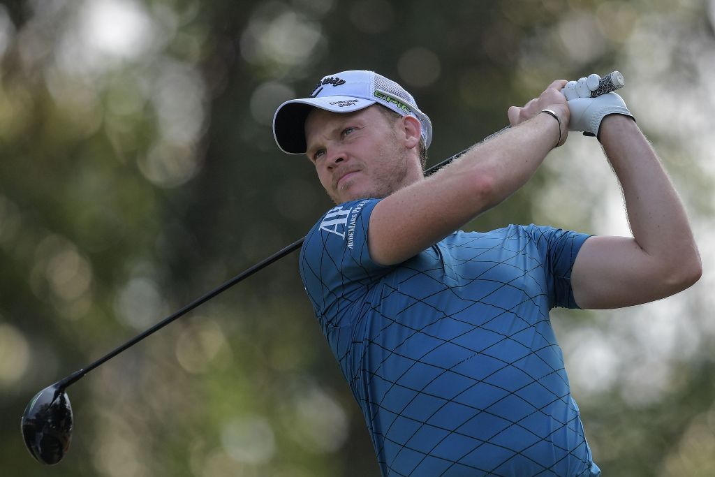 Danny Willett of England tees off during the first round of the 2017 Maybank Malaysia Championship golf tournament at Saujana Golf and Country Club outside Kuala Lumpur on February 9, 2017. / AFP / MOHD RASFAN
