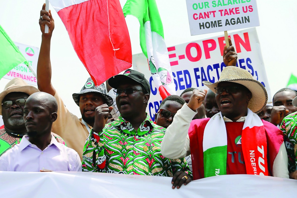 President of the Nigeria Labour Congress, Ayuba Philibus Wabba, leads anti-government protesters during a march in Abuja, Nigeria, yesterday.