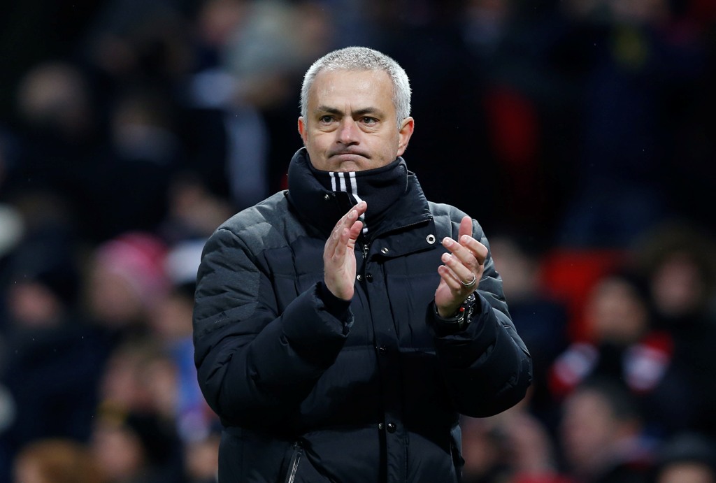 Manchester United manager Jose Mourinho applauds fans after the game Reuters / Andrew Yates
