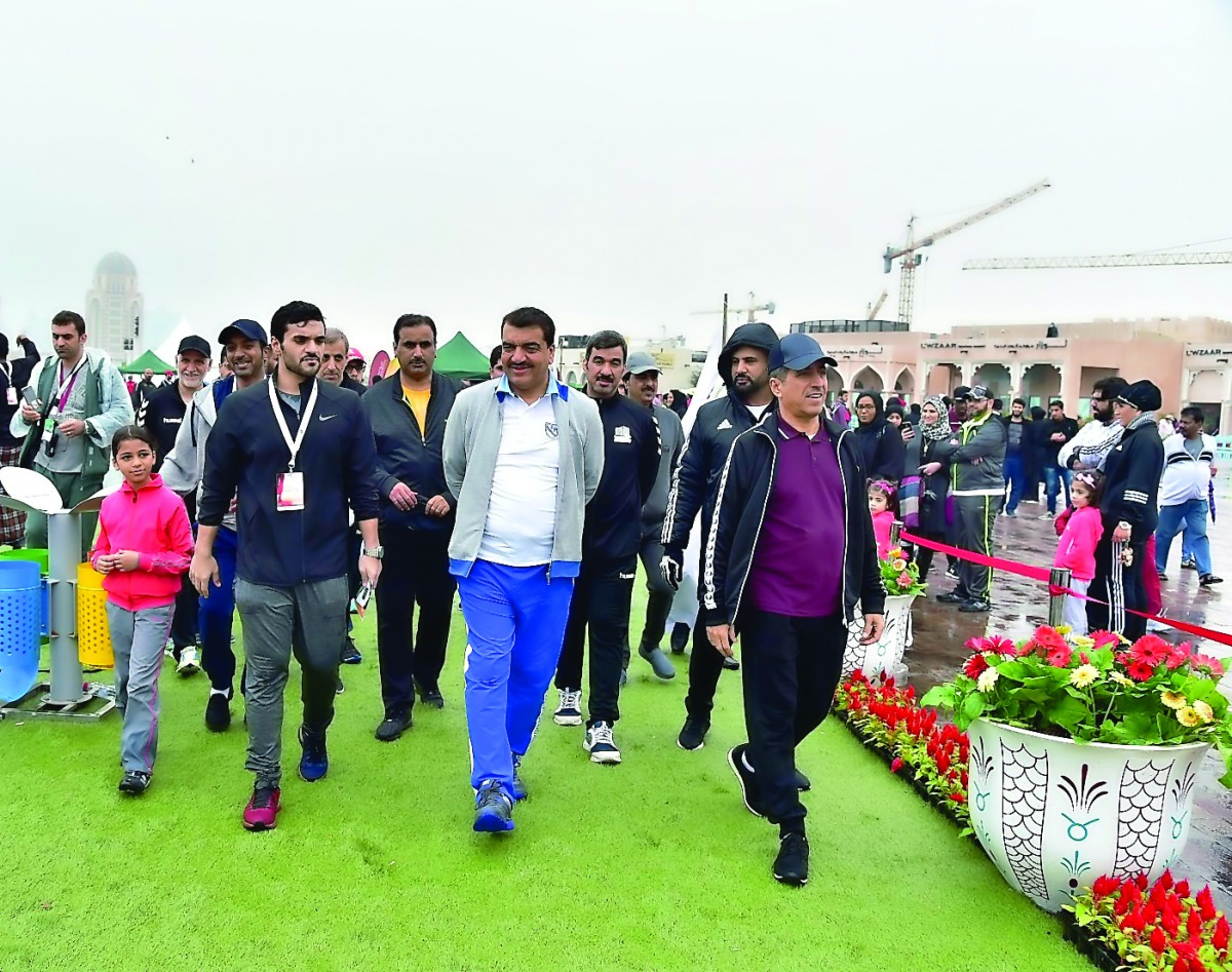 Minister of Municipality and Environment H E Mohamed bin Abdullah Al Rumaihi participating in National Sport Day yesterday.  