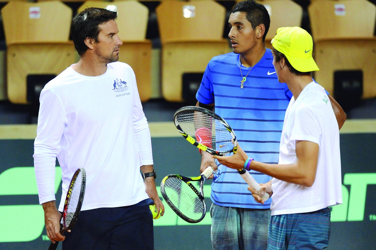 A file photo shows Australia's Davis Cup captain Pat Rafter (extreme left) during a training session two days before the Davis Cup first round between France and Australia  in western France. Rafter stepped down as Tennis Australia's head of performance y