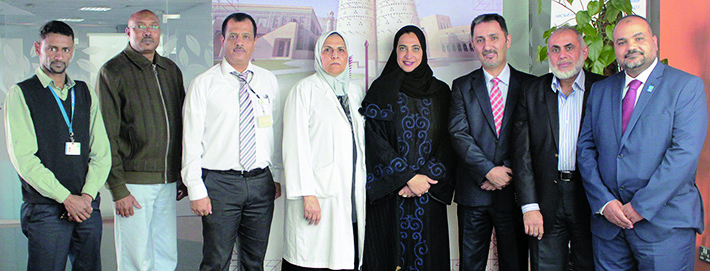 Dr Huda Al Naemi along with HMC staff working on the project.