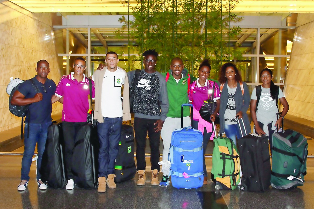 Athletes from the Qatar Olympic Committee’s Shine Project pose for a photograph upon their arrival at the Hamad International Airport yesterday.
