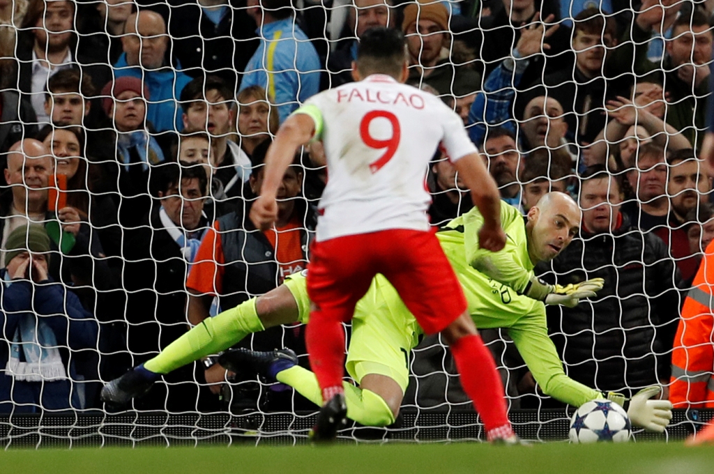 Manchester City's Willy Caballero saves a penalty from Monaco's Radamel Falcao. Reuters / Lee Smith Livepic
