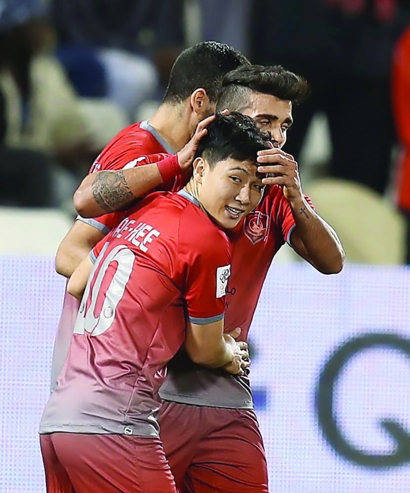 Lekhwiya's Nam Tae-Hee celebrates after scoring a goal during their AFC Champions League match against Al Fateh at Prince Abdullah Bin Jalawi Stadium yesterday.