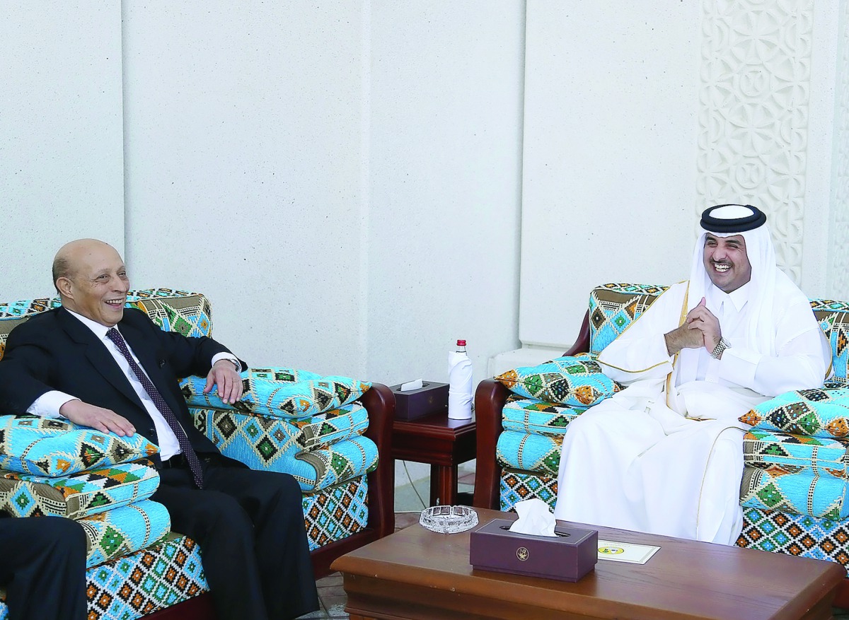 Emir H H Sheikh Tamim bin Hamad Al Thani with the Speaker of the People's National Assembly of Algeria Dr Mohammed Al Arabi Ould Khalifa, at the Emiri Diwan yesterday. The meeting was attended by the Speaker of the Advisory Council H E Mohammed bin Mubara