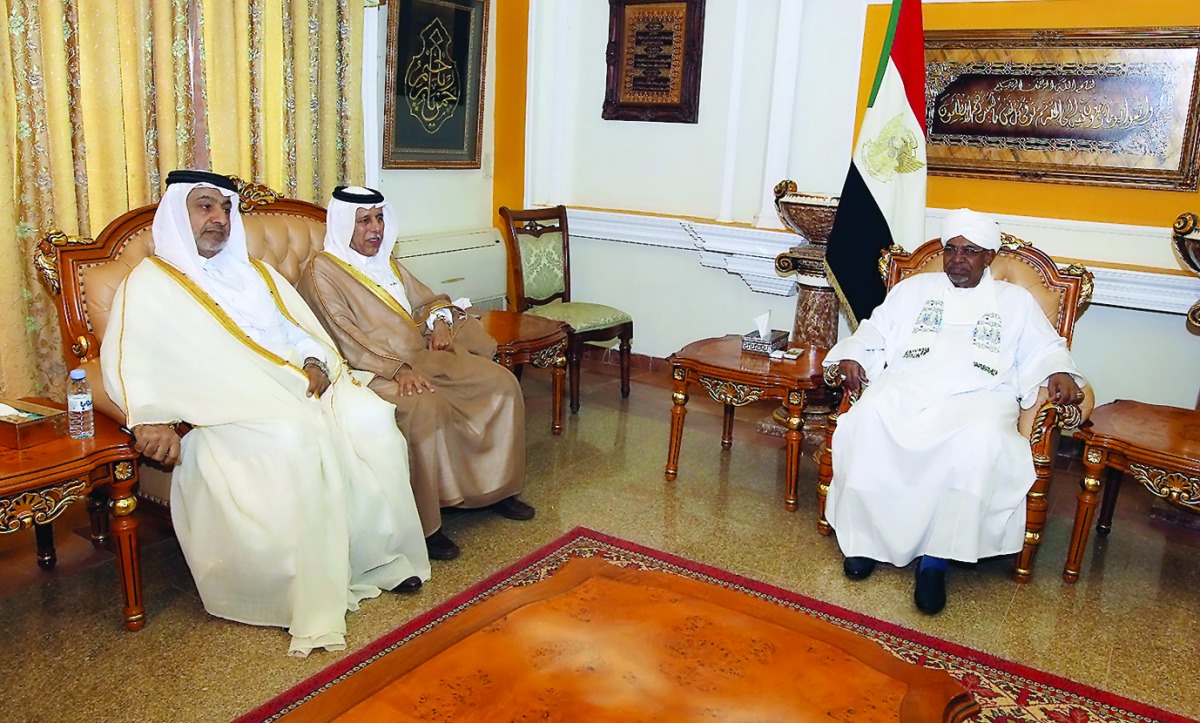Deputy Prime Minister and Minister of State for Cabinet Affairs H E Ahmed bin Abdullah bin Zaid Al Mahmoud with President of the Republic of Sudan, Omar Hassan Ahmad Al Bashir, in Khartoum yesterday.