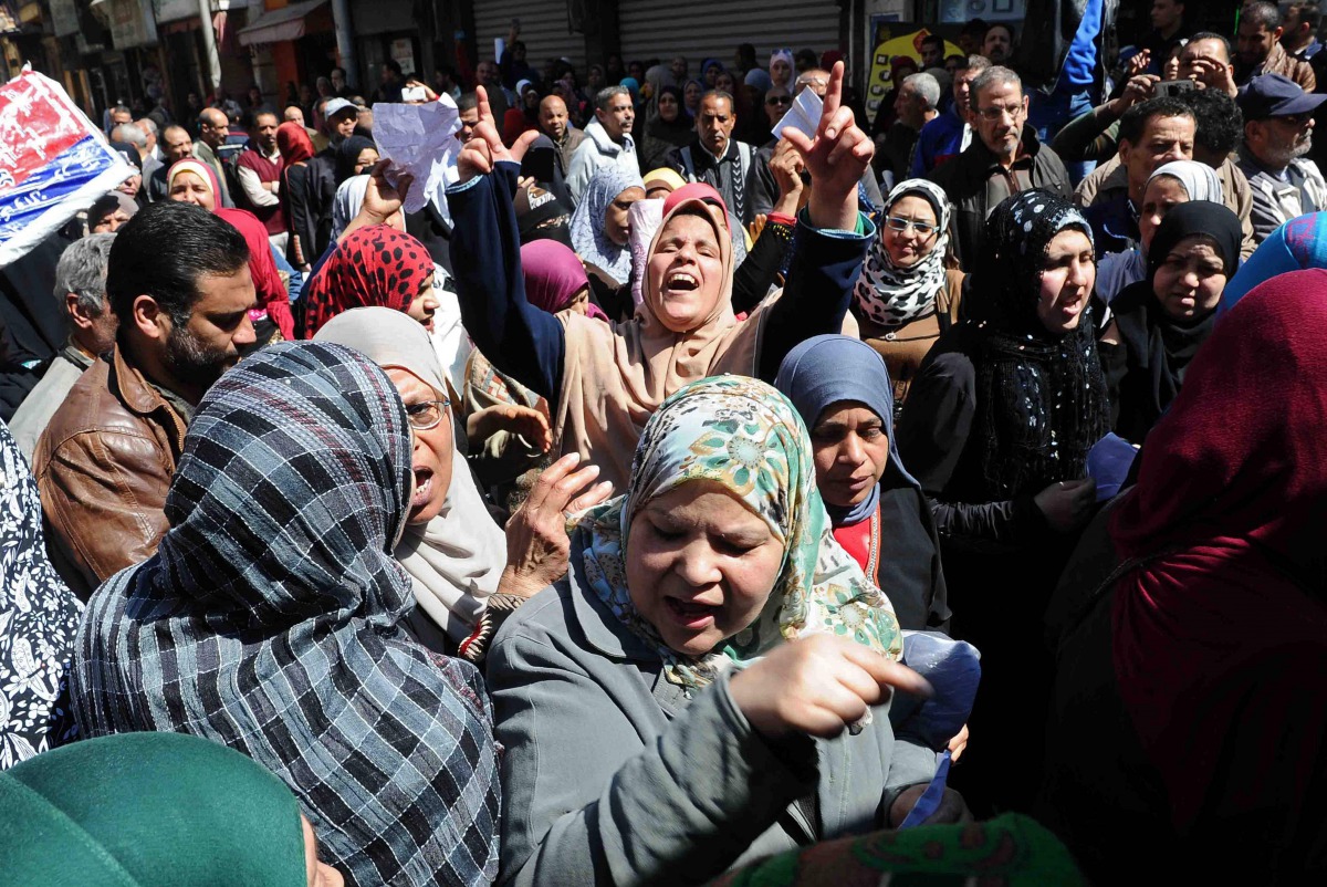 Dozens of Egyptians take part in demonstration in front of a government office in downtown Alexandria on March 7, 2017, against the decision of the supply ministry to limit the distribution of subsidised bread to holders of a new system of digital cards i