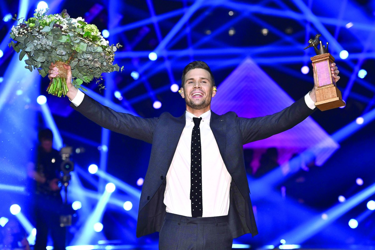 Swedish singer Robin Bengtsson celebrates winning the finale in the Swedish song contest 'Melodifestivalen' with the entry 'I Can't Go On' at the Friends Arena in Stockholm, on March 11, 2017.
Bengtsson' song 'I Can't Go On' will represent Sweden in the 