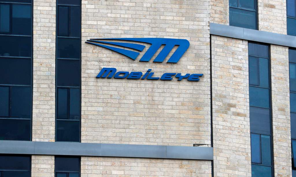 A picture taken on March 13, 2017, shows the logo of Israeli car tech firm Mobileye at the company's offices in Jerusalem. Intel will buy Mobileye for more than $15 billion (14 billion euros), the companies said, in a deal signalling the US computer chip 