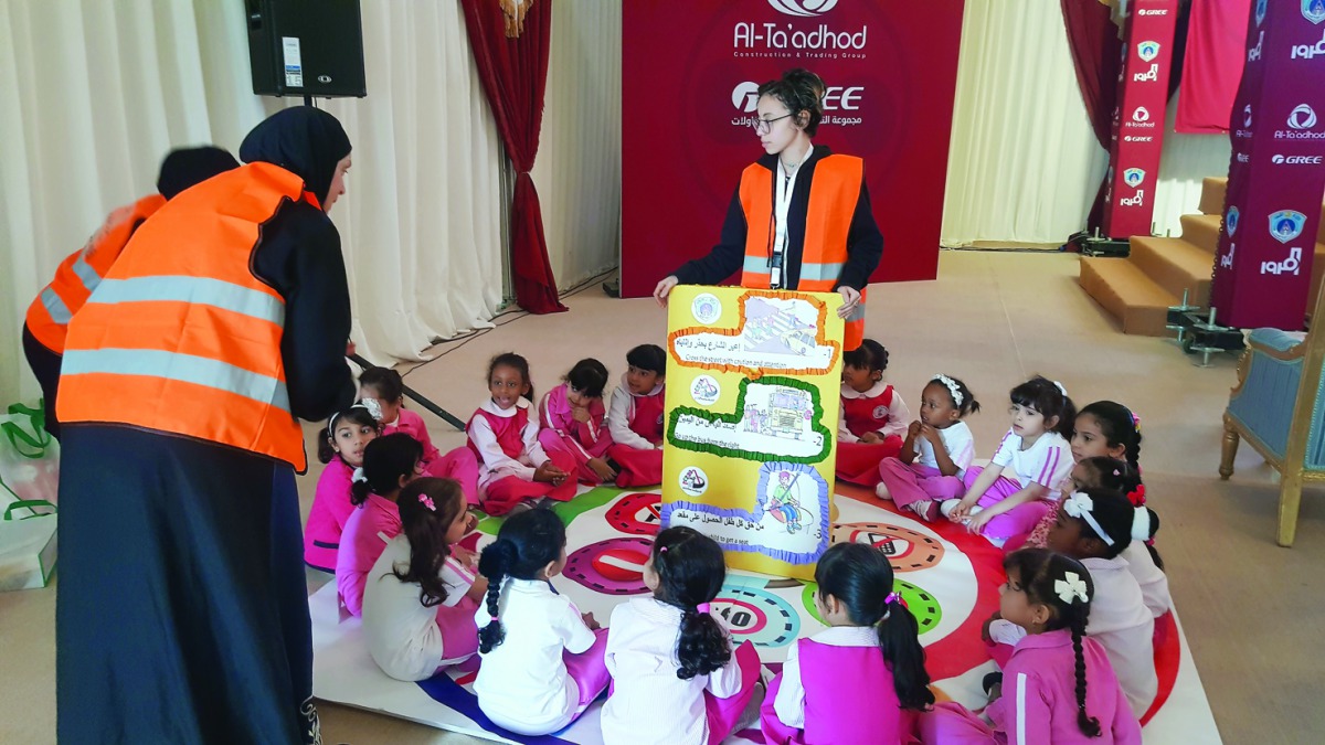Children taking part in the 33rd GCC Traffic Week at Darb El Saai.