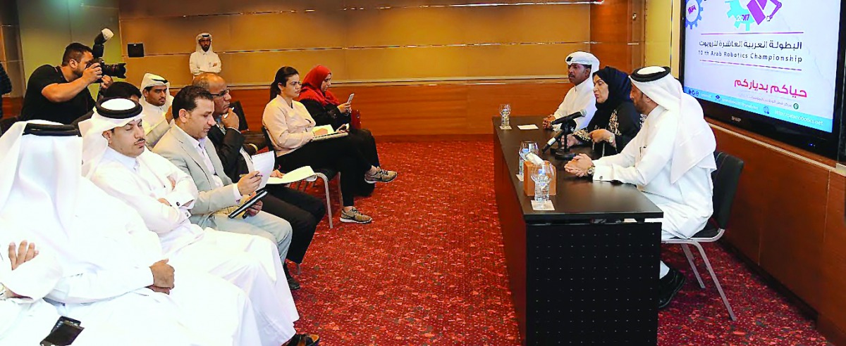 Officials announcing the programmes at a conference.