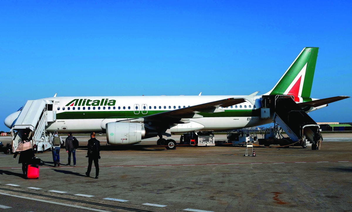 An Alitalia plane on the runway at the airport of Brindisi.  