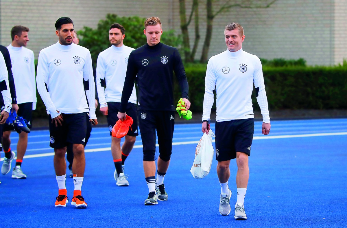 German team players Toni Kroos, Emre Can and Marc-Andre ter Stegen during a training session at the Sportschule Kaiserau, Kamen in Germany, yesterday.