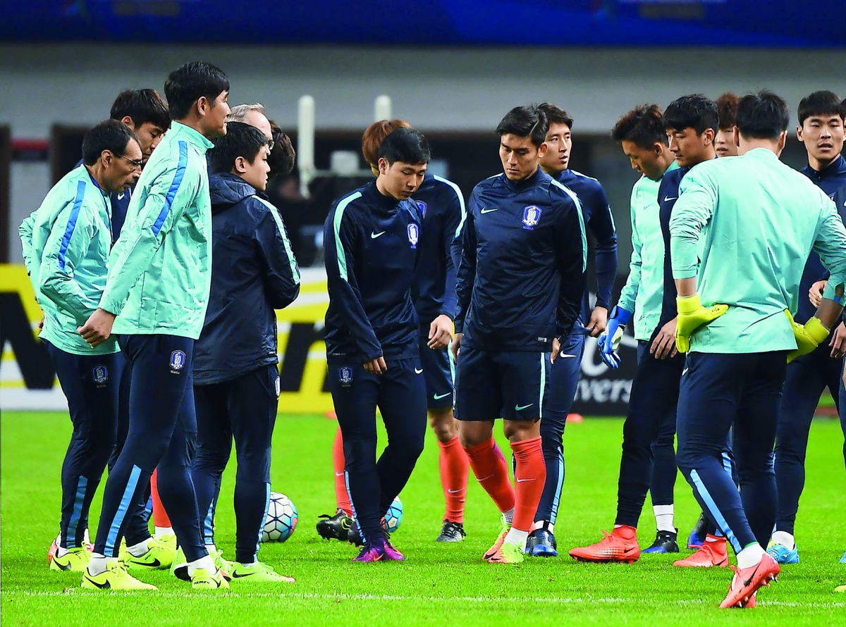 South Korean players gather for a training session on the eve of their World Cup football qualifying match against China in Changsha, China's central Hunan province.