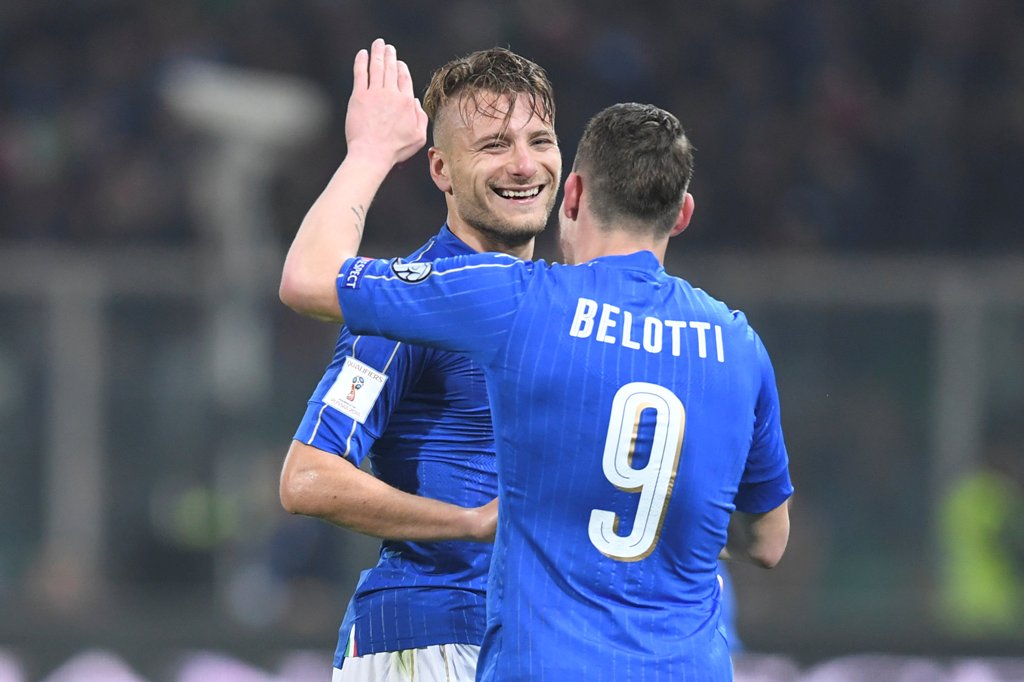 Italy's Ciro Immobile celebrates with his team mate Andrea Belotti after scoring. REUTERS/Alberto Lingria 
