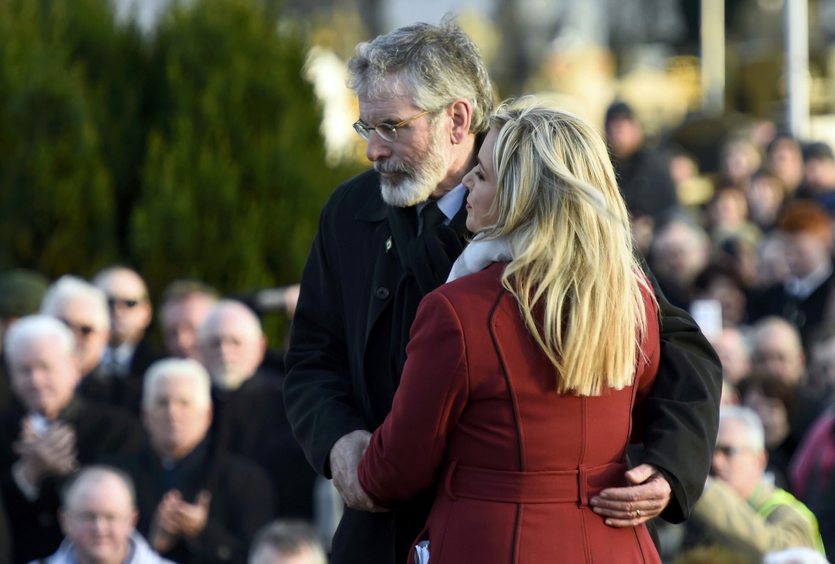 FILE PHOTO: Sinn Fein's Michelle O'Neill and Gerry Adams join mourners at Martin McGuinness's funeral in Londonderry, Northern Ireland, March 23, 2017. REUTERS/Clodagh Kilcoyne