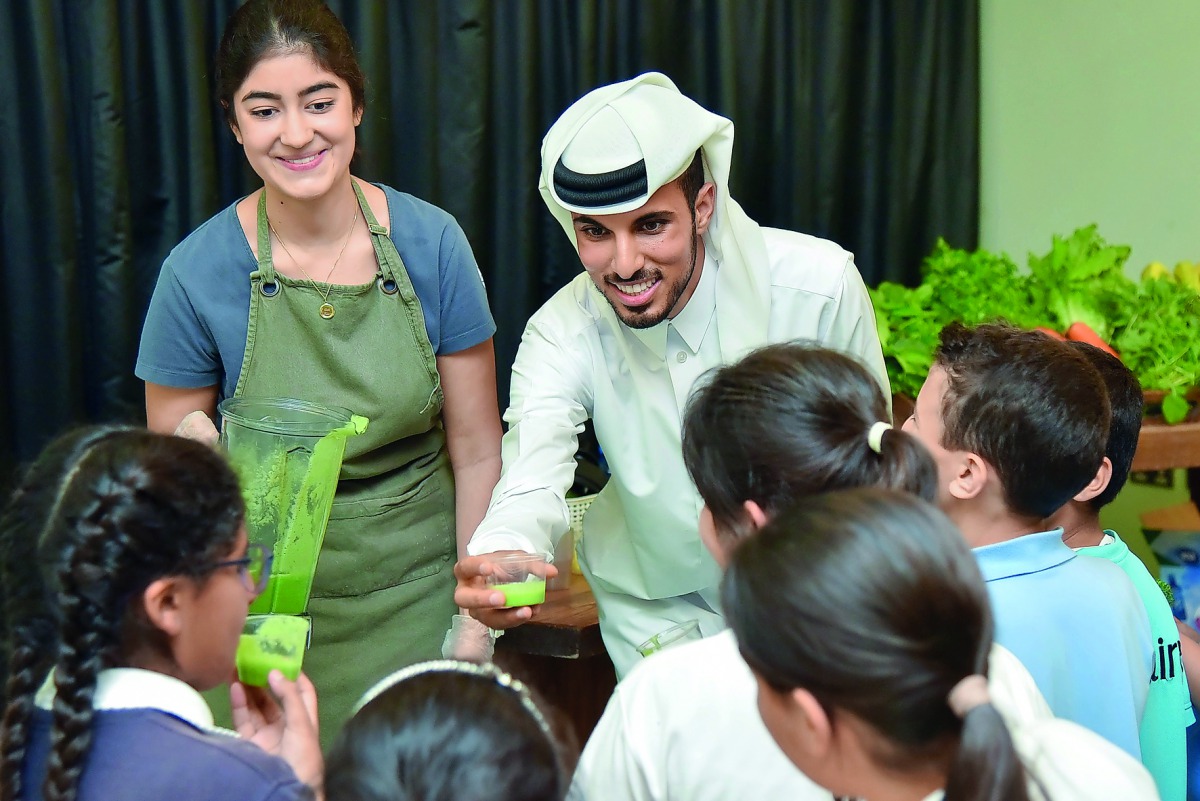 Prominent local vegan restaurateur Ghanem Al Sulaiti during a school visit.