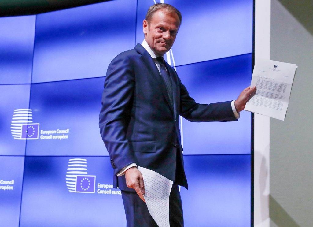 European Council President Donald Tusk shows British Prime Minister Theresa May's Brexit letter in notice of the UK's intention to leave the bloc under Article 50 of the EU's Lisbon Treaty, at the end of a news conference in Brussels, Belgium March 29, 20