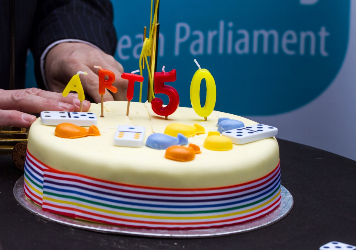 A member of Britain's UK Independence Party (UKIP) posed with cakes celebrating the official triggering of Article 50 of the Lisbon Treaty, the Brexit outside the European Union Council headquarters in Brussels, Belgium March 29, 2017. REUTERS/Stringer