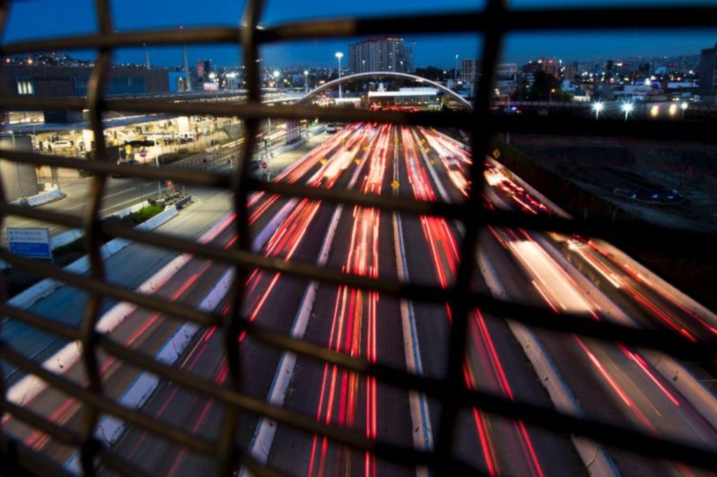 Cars cross the border into Mexico from San Diego, California (AFP Photo/Jim Watson).