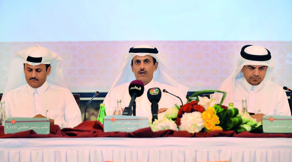 Sheikh Dr. Khalid bin Thani bin Abdullah Al Thani (centre), QIIB Chairman and Managing Director; Sheikh Abdullah bin Thani bin Abdullah Al Thani (left), QIIB Vice-Chairman, and Abdulbasit Ahmed Al Shaibei, QIIB Chief Executive Officer during the QIIB Ordi