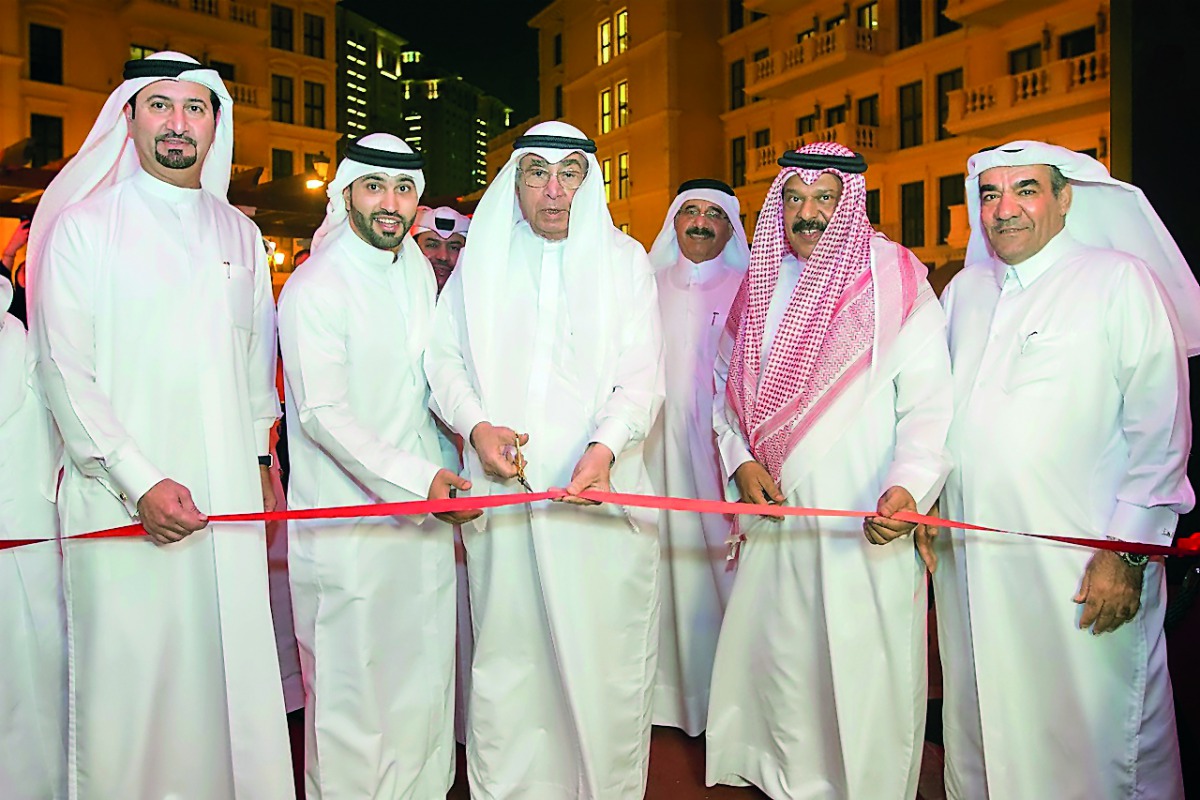 Hussain Alfardan, owner, Alfardan Group, and Fardan Fahad Hussain Alfardan, owner, Gymmito, and other officials cutting the ribbon to open Gymmito Fitness Club at Qanat Quartier.