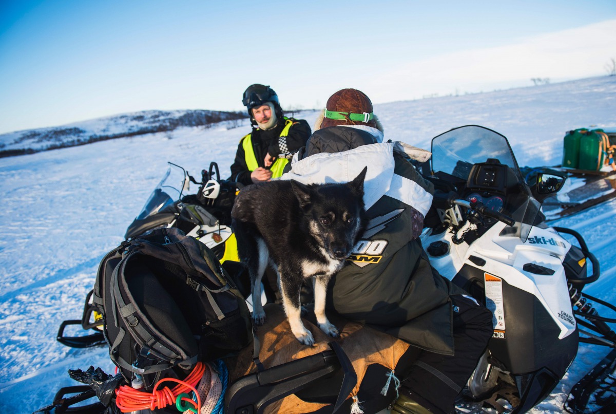 This file photo taken on March 15, 2017 shows Norwegian reindeer police officer Jim Hugo Hansen talking with a local Sami during a patrol at the Finnmark county, located in the northeastern part of Norway, on March 15, 2017. AFP / Jonathan Nackstrand

