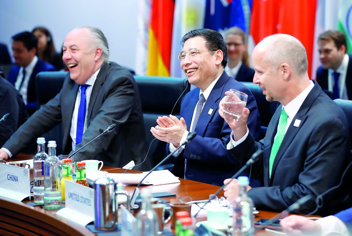 Miao Wei, China's Minister of Industry and Information Technology, Matthias Machnig, deputy minister of Germany's economy minister and special assistant to the US secretary of commerce Apollo Fuhrimann at the start of the first ever general assembly of G2