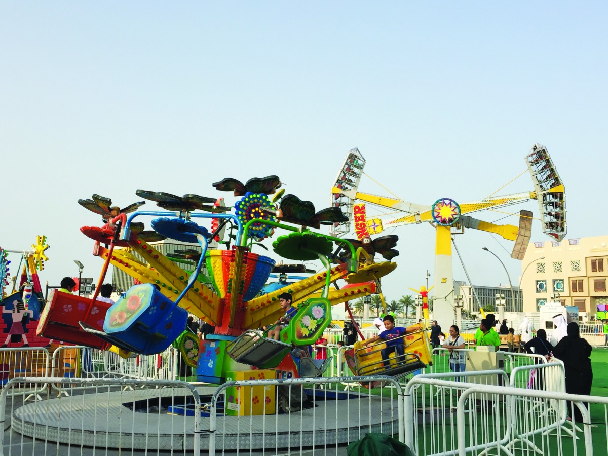 Children enjoy rides at the amusement park at the Al Ahmed Square in Souq Waqif which is the main highlight of the festival. Pic: Raynald C Rivera / The Peninsula