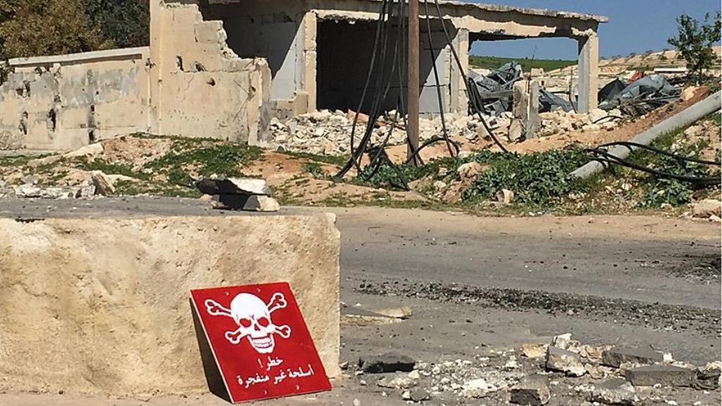 A poison hazard danger sign is seen in the town of Khan Shaykun, Idlib province, Syria on April 5, 2017. On Tuesday more than 100 civilians had been killed and 500 others, mostly children, injured in Assad Regime's suspected chlorine gas attack carried ou